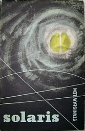 Cover of Solaris, with an abstract black-and-white representation of a galaxy with a yellow brain shape in the center.