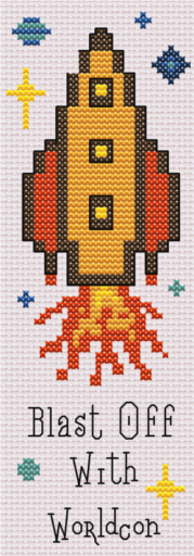 Cross stitch bookmark with a rocket ship launching above the text Blast Off with Worldcon.