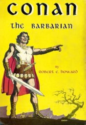 Cover of the 1954 edition of Robert E. Howard's Conan the Barbarian, featuring a smiling white man with wavy dark hair wearing a Roman-style kilt, leather sandals, and armor chestplate, holding a swords and pointing into the distance.