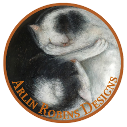 Arlin Robins Designs on a drawing of Yin/Yang Cats