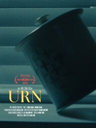 Urn poster Poster for Urn with a ceramic urn balanced on its edge on a shelf.