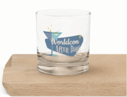Image of a cocktail glass sitting on a wooden board. The Worldcon logo appears on the glass in blue with the words 'Worldcon After Dark' in white on the logo.