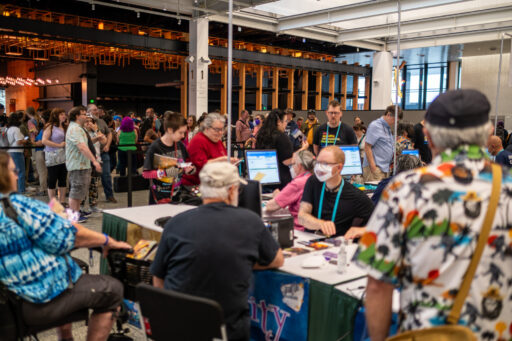 A large crowd of waiting to get their badges at Registration